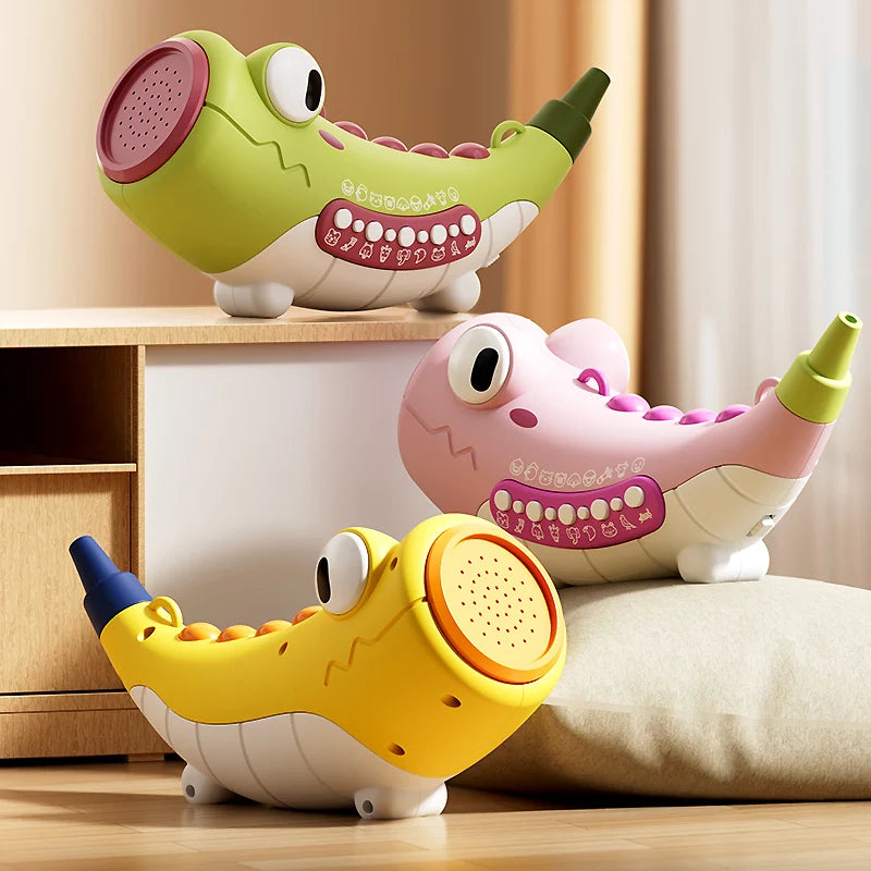 Three colorful toy crocodiles on a wooden surface with a neutral background